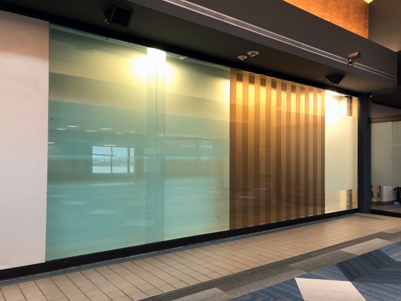 Commercial window film applied to glass for privacy